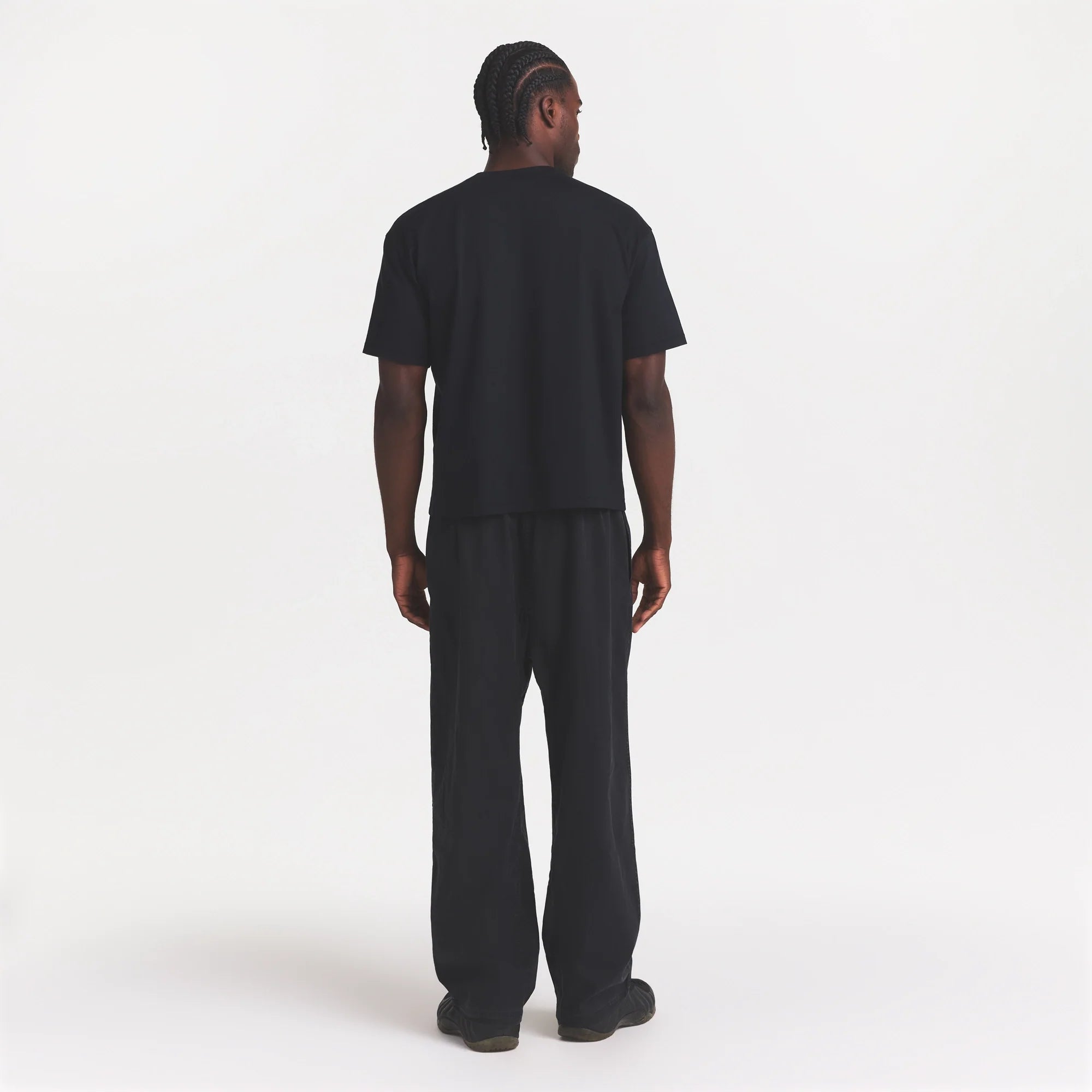 WOVEN MENS KARATE PANT | ONYX ON A MODEL FRONT VIEW @ | FOCUS: 0.0, 1.0, 0.9