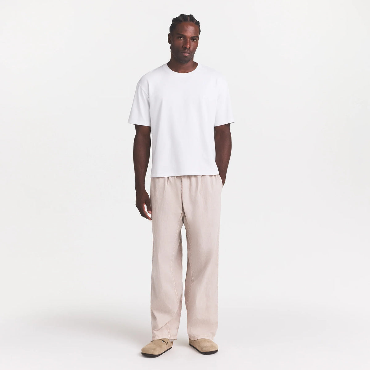 WOVEN MENS KARATE PANT | STONE ON A MODEL FRONT VIEW @ | FOCUS: 0.0, 1.0, 0.9