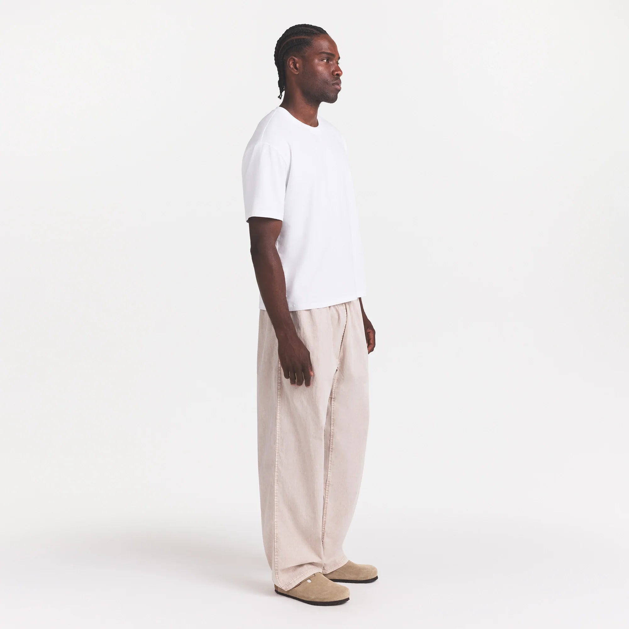 WOVEN MENS KARATE PANT | STONE ON A MODEL FRONT VIEW @ | FOCUS: 0.0, 1.0, 0.9