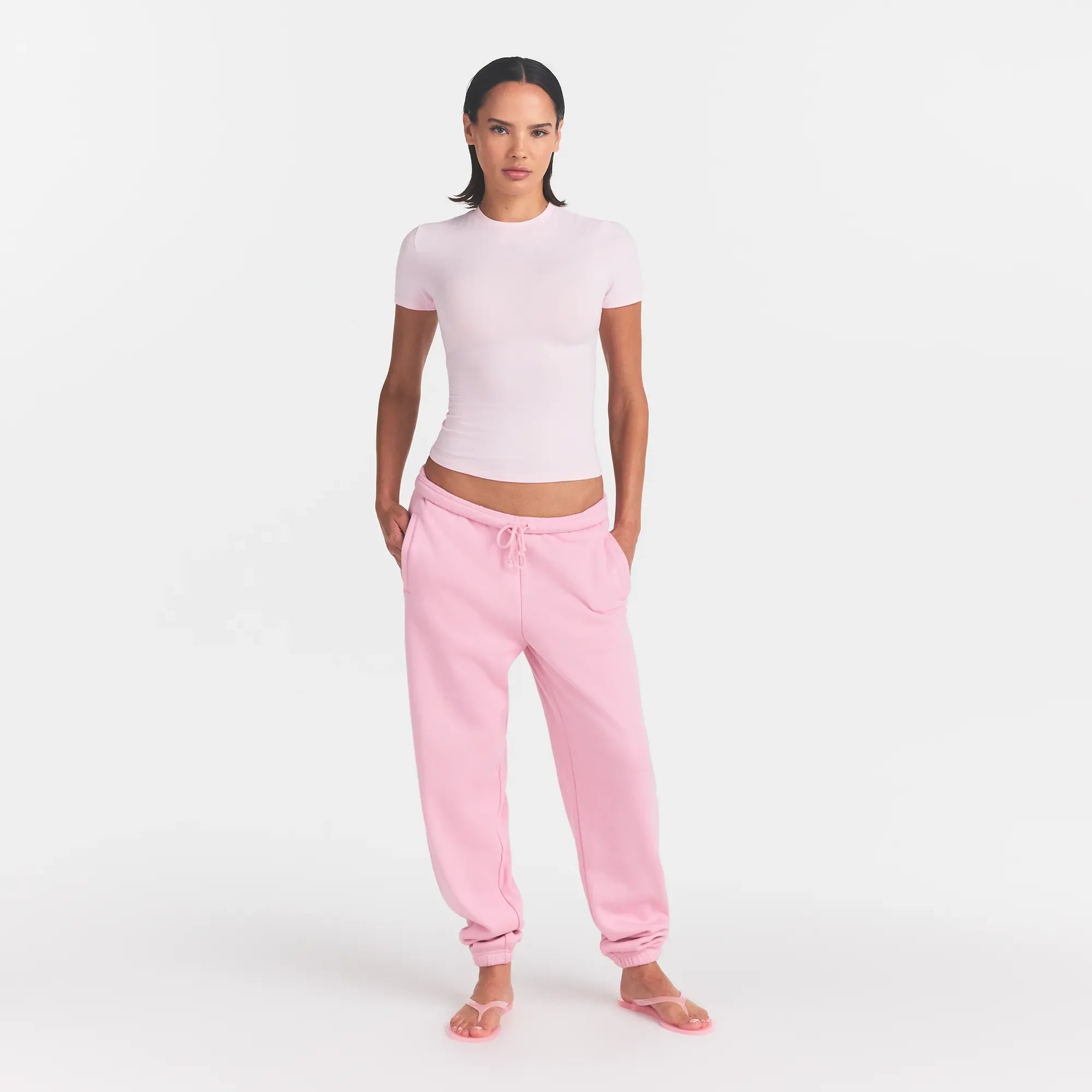 COTTON FLEECE JOGGER | HALITE WITH SNOW LOGO ON A MODEL FRONT VIEW @ | FOCUS: 0.0, 1.0, 0.9