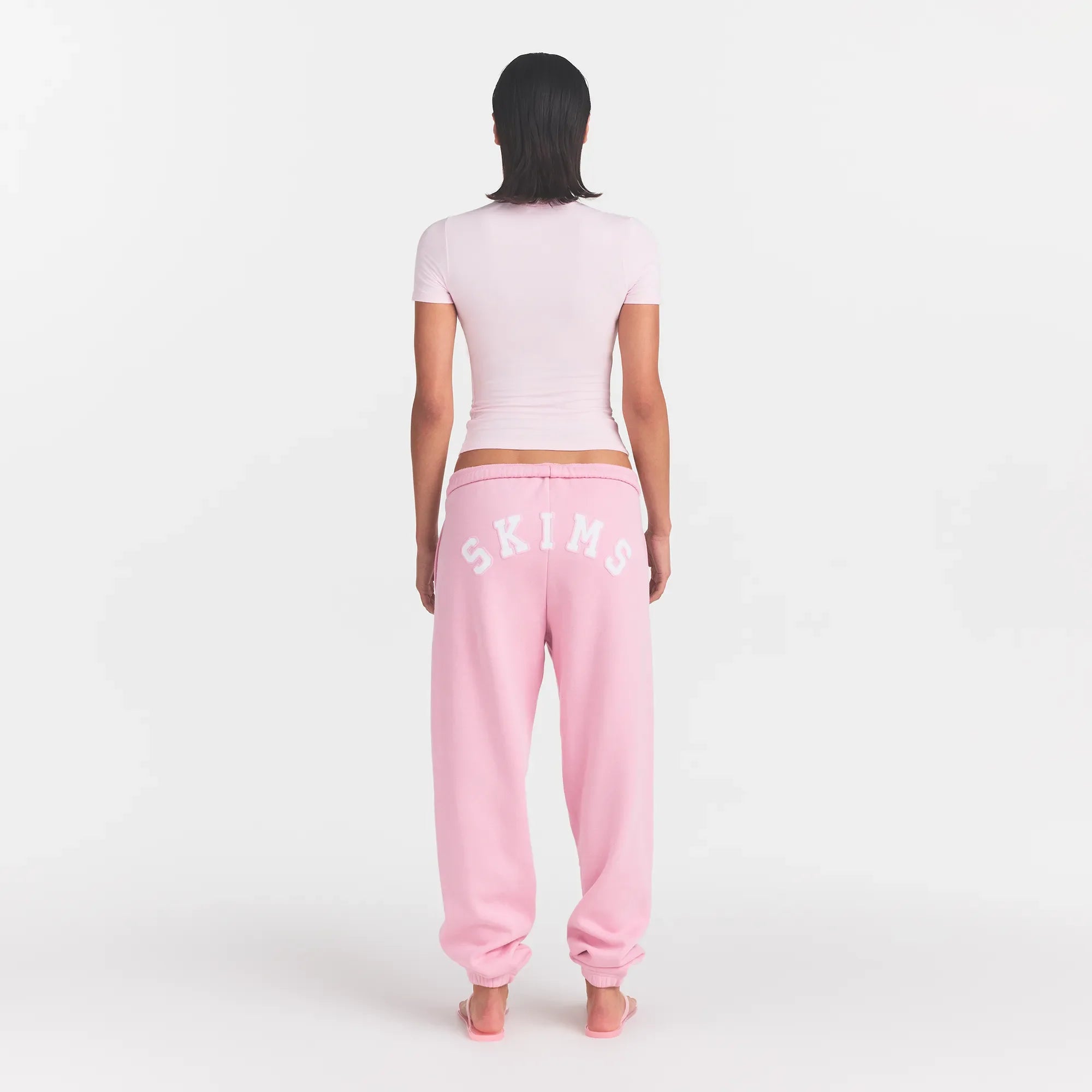 COTTON FLEECE JOGGER | HALITE WITH SNOW LOGO ON A MODEL BACK VIEW @ | FOCUS: 0.0, 1.0, 0.9
