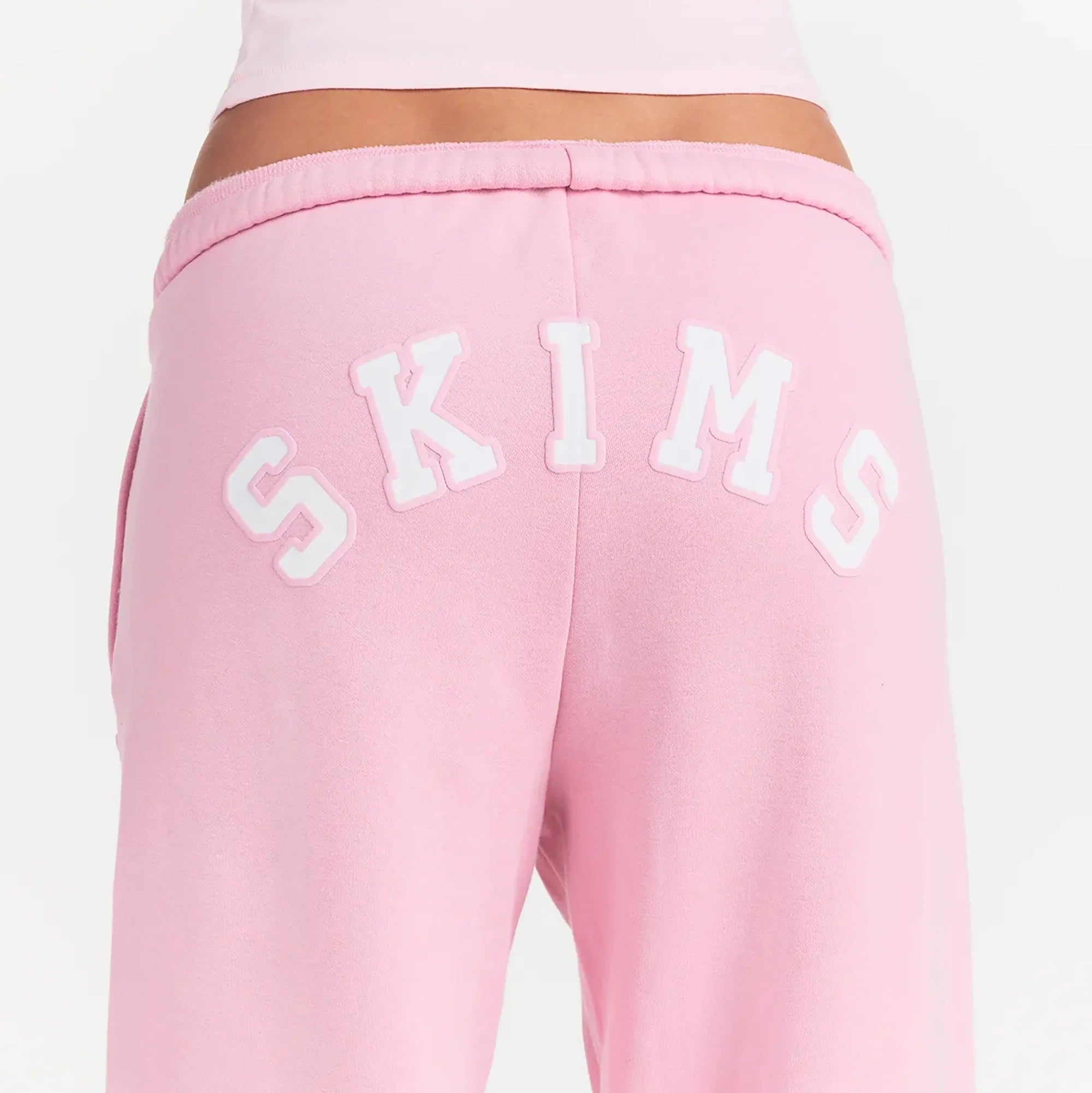 COTTON FLEECE JOGGER | HALITE WITH SNOW LOGO ON A MODEL BACK VIEW @ | FOCUS: 0.0, 1.0, 0.9