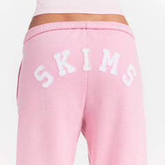 COTTON FLEECE JOGGER | HALITE WITH SNOW LOGO ON A MODEL BACK VIEW @ | FOCUS: 0.0, 1.0, 0.9