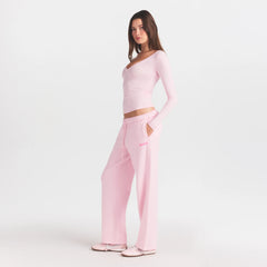COTTON FLEECE STRAIGHT LEG PANT WITH EMBOSSED LOGO | CHERRY BLOSSOM ON A MODEL FRONT VIEW @ | FOCUS: 0.0, 1.0, 0.9