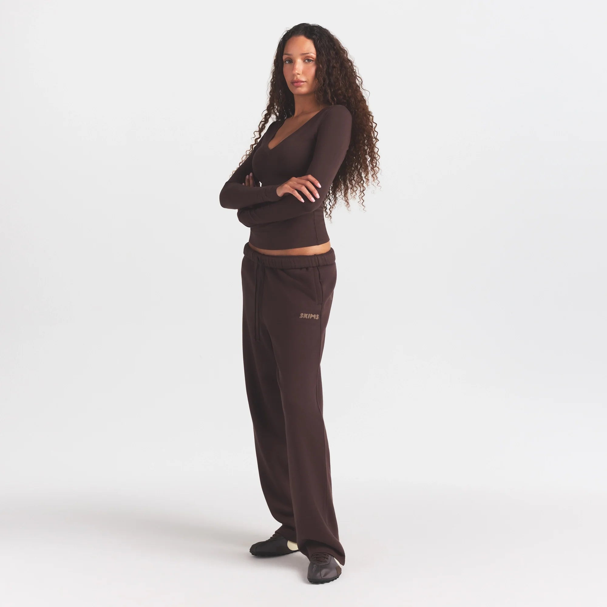 COTTON FLEECE STRAIGHT LEG PANT WITH EMBOSSED LOGO | ESPRESSO ON A MODEL FRONT VIEW @ | FOCUS: 0.0, 1.0, 0.9