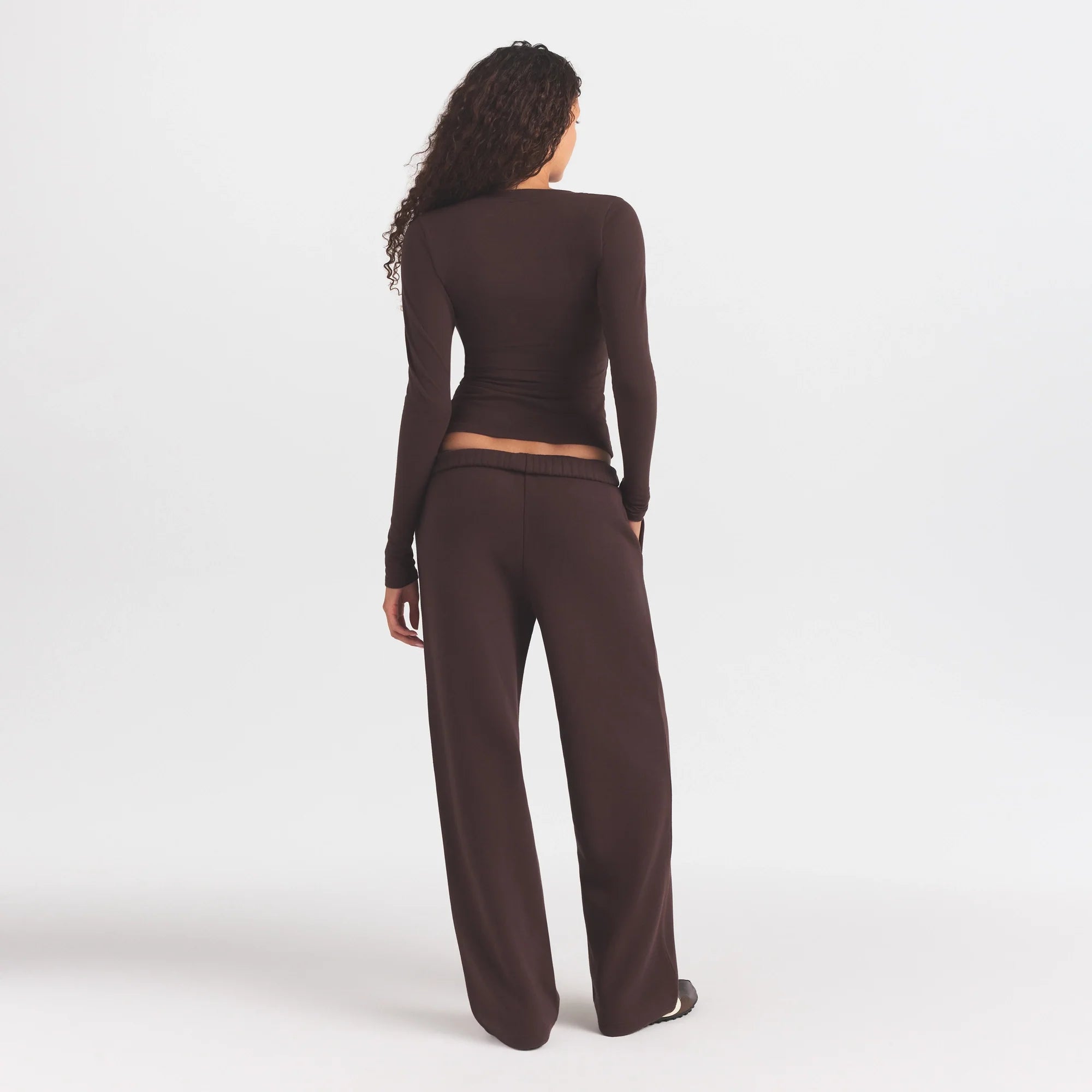 COTTON FLEECE STRAIGHT LEG PANT WITH EMBOSSED LOGO | ESPRESSO ON A MODEL FRONT VIEW @ | FOCUS: 0.0, 1.0, 0.9