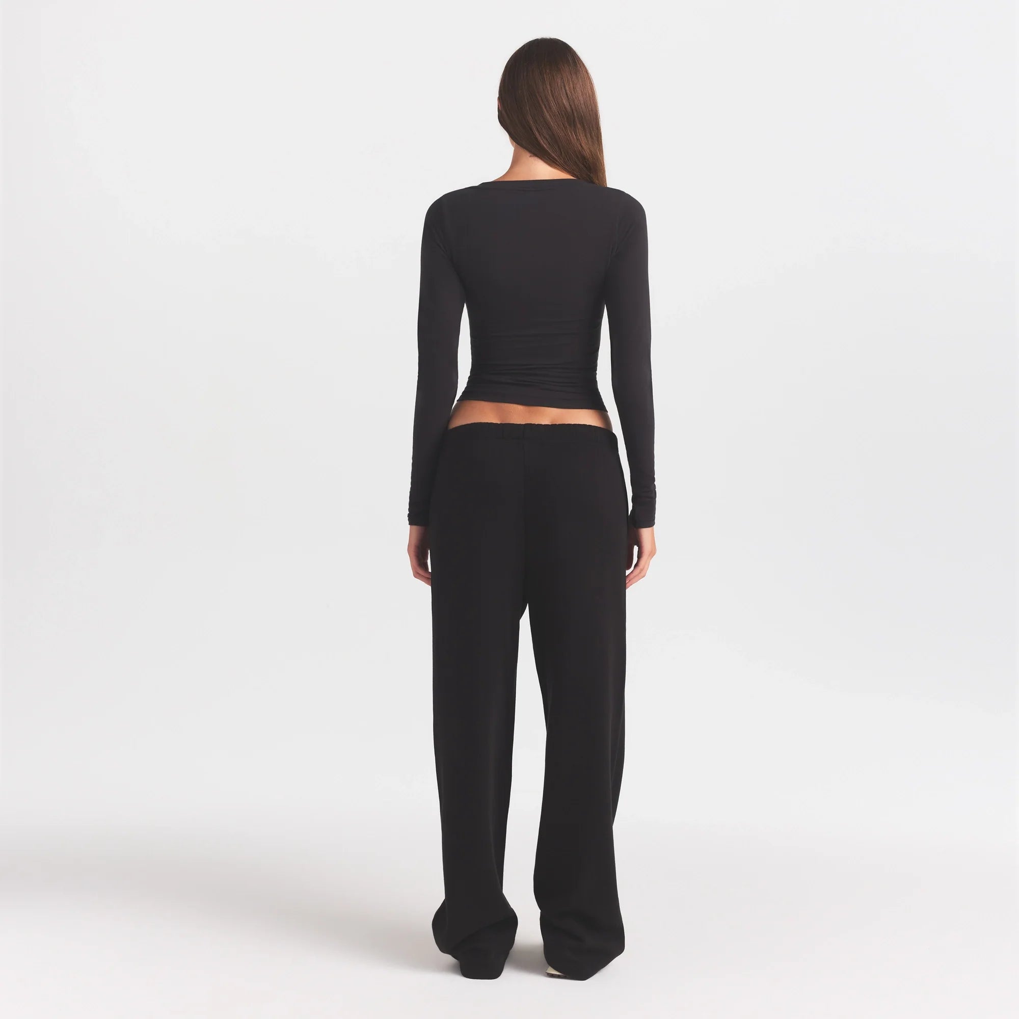 COTTON FLEECE STRAIGHT LEG PANT WITH EMBOSSED LOGO | ONYX ON A MODEL FRONT VIEW @ | FOCUS: 0.0, 1.0, 0.9