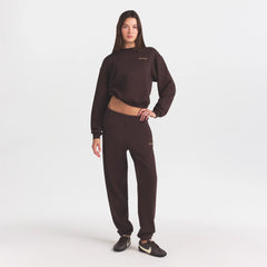 COTTON FLEECE JOGGER WITH EMBOSSED LOGO | ESPRESSO ON A MODEL FRONT VIEW @ | FOCUS: 0.0, 1.0, 0.9