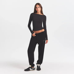 COTTON FLEECE JOGGER WITH EMBOSSED LOGO | ONYX & LAYS FLAT ON A WHITE BACKGROUND | FLT @ | FOCUS: 0.0, 1.0, 0.9