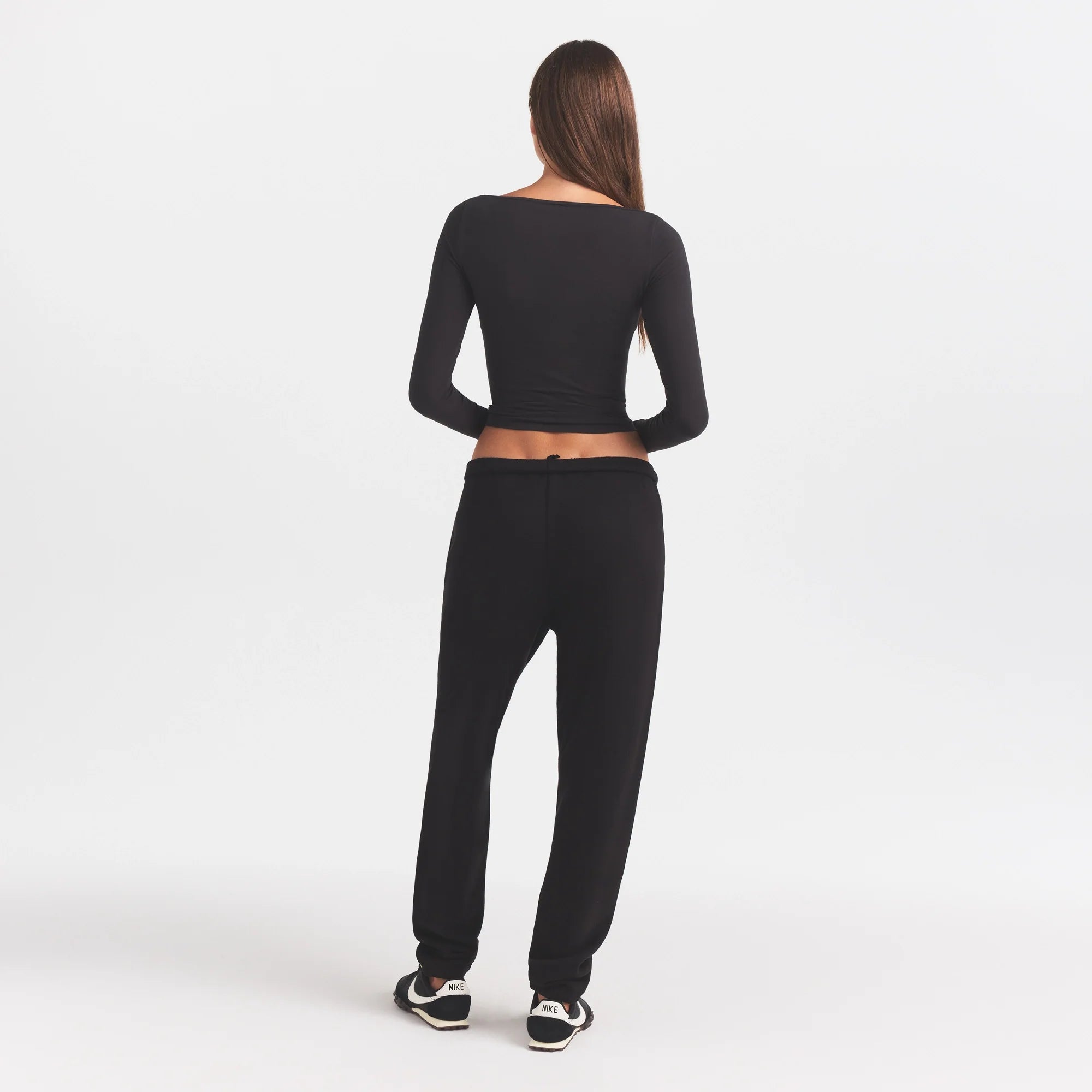 COTTON FLEECE JOGGER WITH EMBOSSED LOGO | ONYX & LAYS FLAT ON A WHITE BACKGROUND | FLT