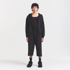 FLEECE LOUNGE MENS RELAXED LONG SHORT | WASHED ONYX ON A MODEL FRONT VIEW @ | FOCUS: 0.0, 1.0, 0.9