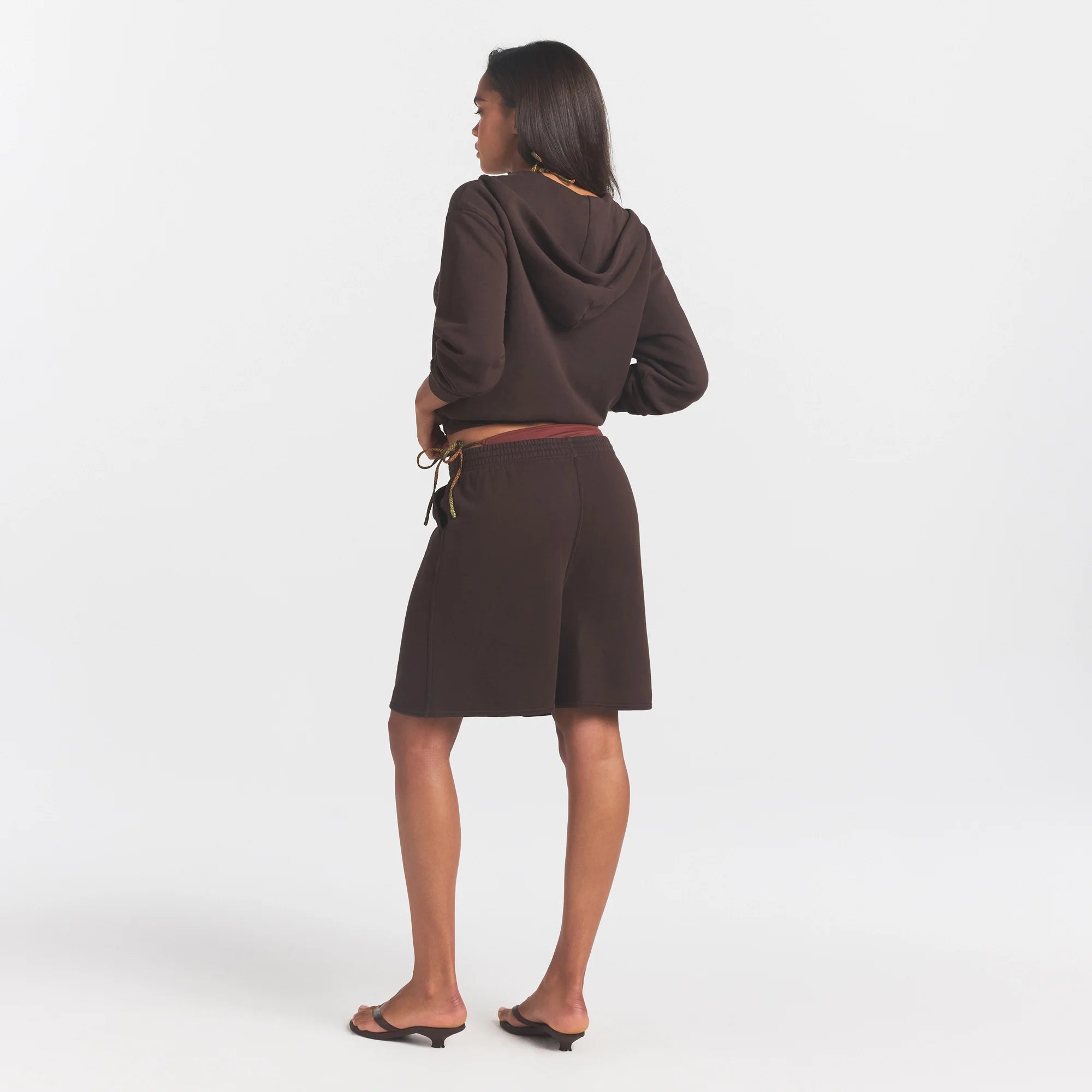 FRENCH TERRY LONG SHORT | ESPRESSO ON A MODEL FRONT VIEW @ | FOCUS: 0.0, 1.0, 0.9