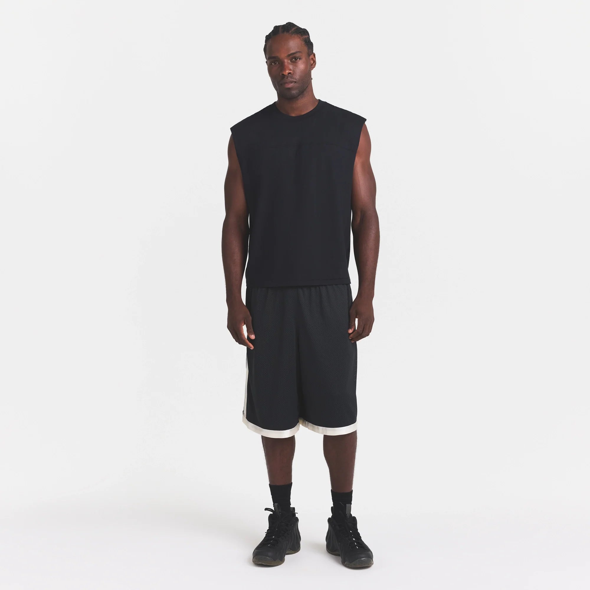 MESH APPAREL MENS LONG SHORT | ONYX ON A MODEL FRONT VIEW @ | FOCUS: 0.0, 1.0, 0.9