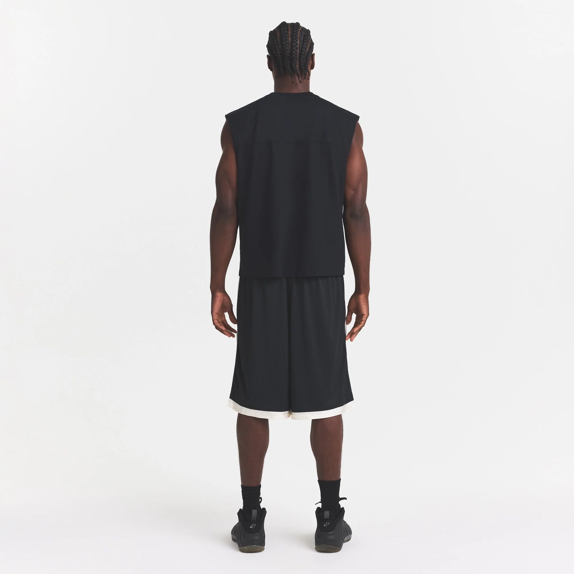 MESH APPAREL MENS LONG SHORT | ONYX ON A MODEL FRONT VIEW @ | FOCUS: 0.0, 1.0, 0.9