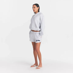 COTTON FLEECE CLASSIC SHORT | LIGHT HEATHER GREY WITH ONYX LOGO ON A MODEL SIDE VIEW @ | FOCUS: 0.0, 1.0, 0.9