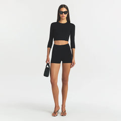 REFINED KNIT HIGH-WAISTED SHORT | OBSIDIAN ON A MODEL FRONT VIEW @ | FOCUS: 0.0, 1.0, 0.9