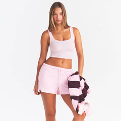 COTTON FLEECE CLASSIC SHORT | CHERRY BLOSSOM ON A MODEL SIDE VIEW @ | FOCUS: 0.0, 1.0, 0.9