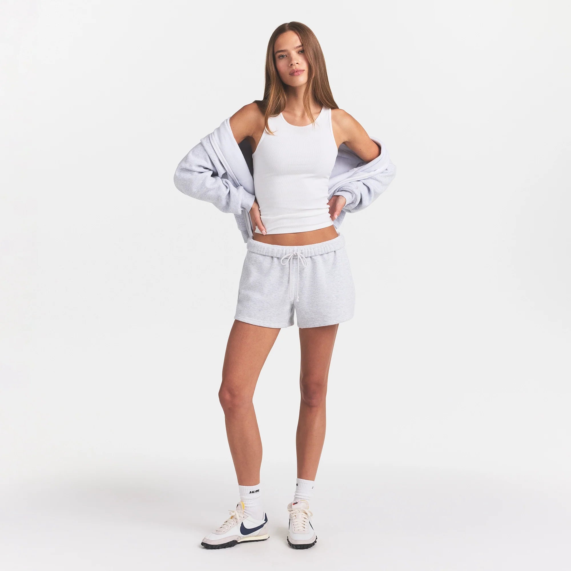 COTTON FLEECE CLASSIC SHORT | LIGHT HEATHER GREY ON A MODEL FRONT VIEW @ | FOCUS: 0.0, 1.0, 0.9