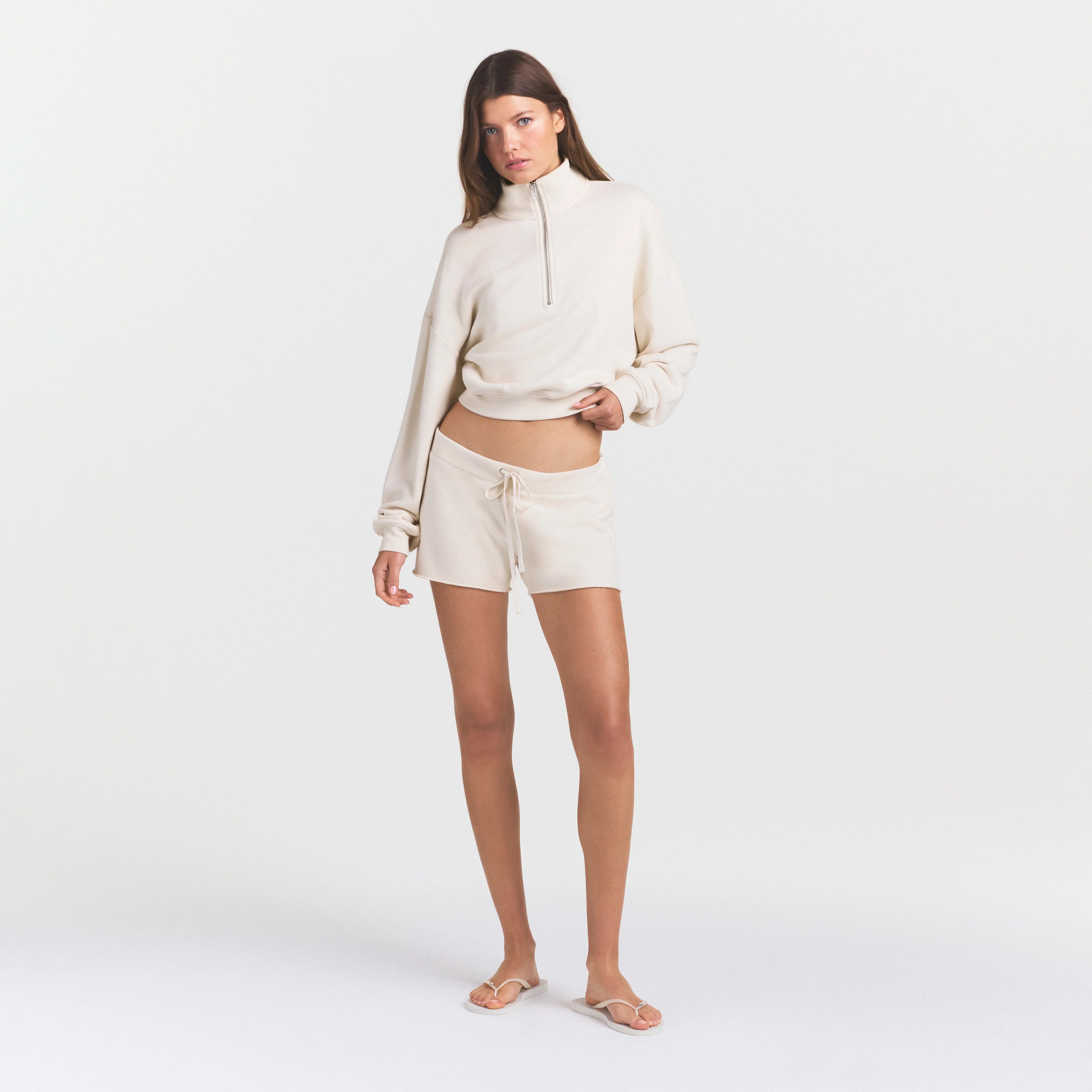 DRAPEY FRENCH TERRY SHORT | BUFF ON A MODEL FRONT VIEW @ | FOCUS: 0.0, 1.0, 0.9