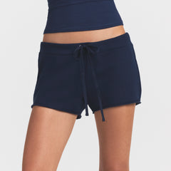 DRAPEY FRENCH TERRY SHORT | NAVY ON A MODEL SIDE VIEW @ | FOCUS: 0.0, 1.0, 0.9