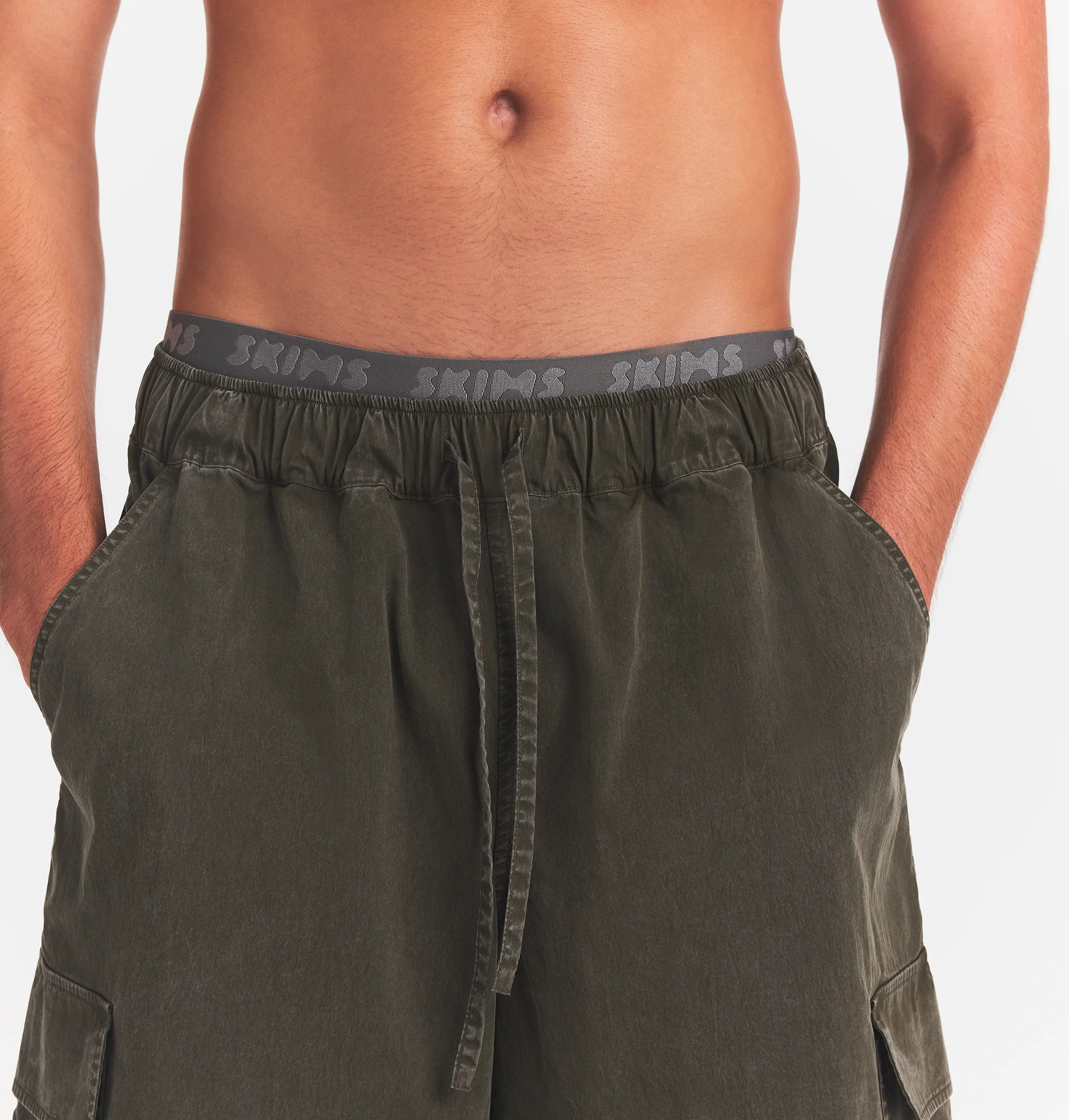 WOVEN MENS RELAXED CARGO SHORT | JUNGLE ON A MODEL FRONT VIEW @ | FOCUS: 0.0, 1.0, 0.9