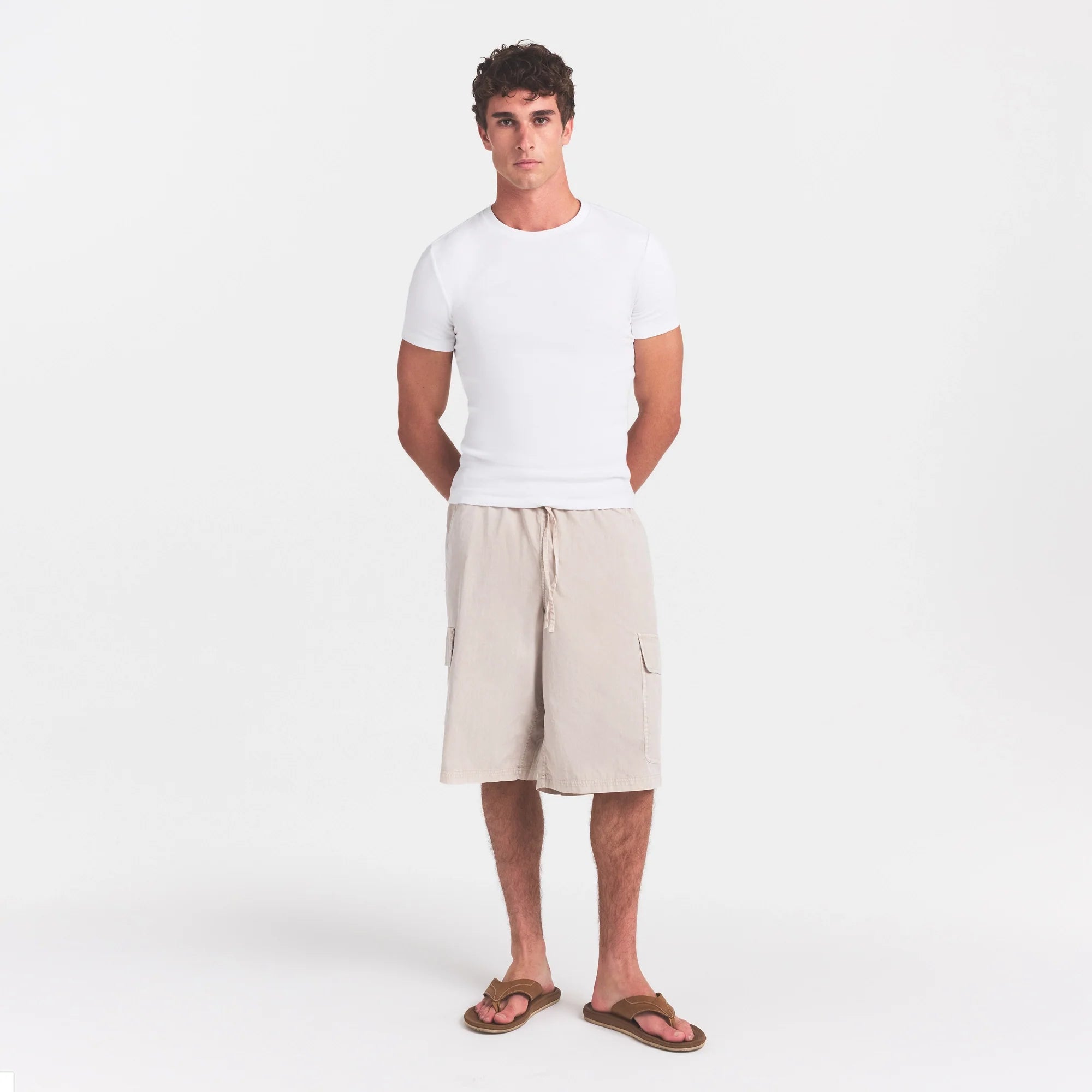 WOVEN MENS RELAXED CARGO SHORT | STONE ON A MODEL FRONT VIEW @ | FOCUS: 0.0, 1.0, 0.9