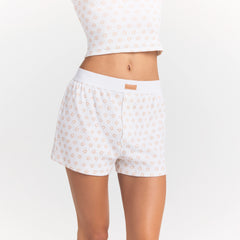 COTTON RIB LOOSE BOXER | OCHRE HORSESHOE PRINT ON A MODEL SIDE VIEW @ | FOCUS: 0.0, 1.0, 0.9