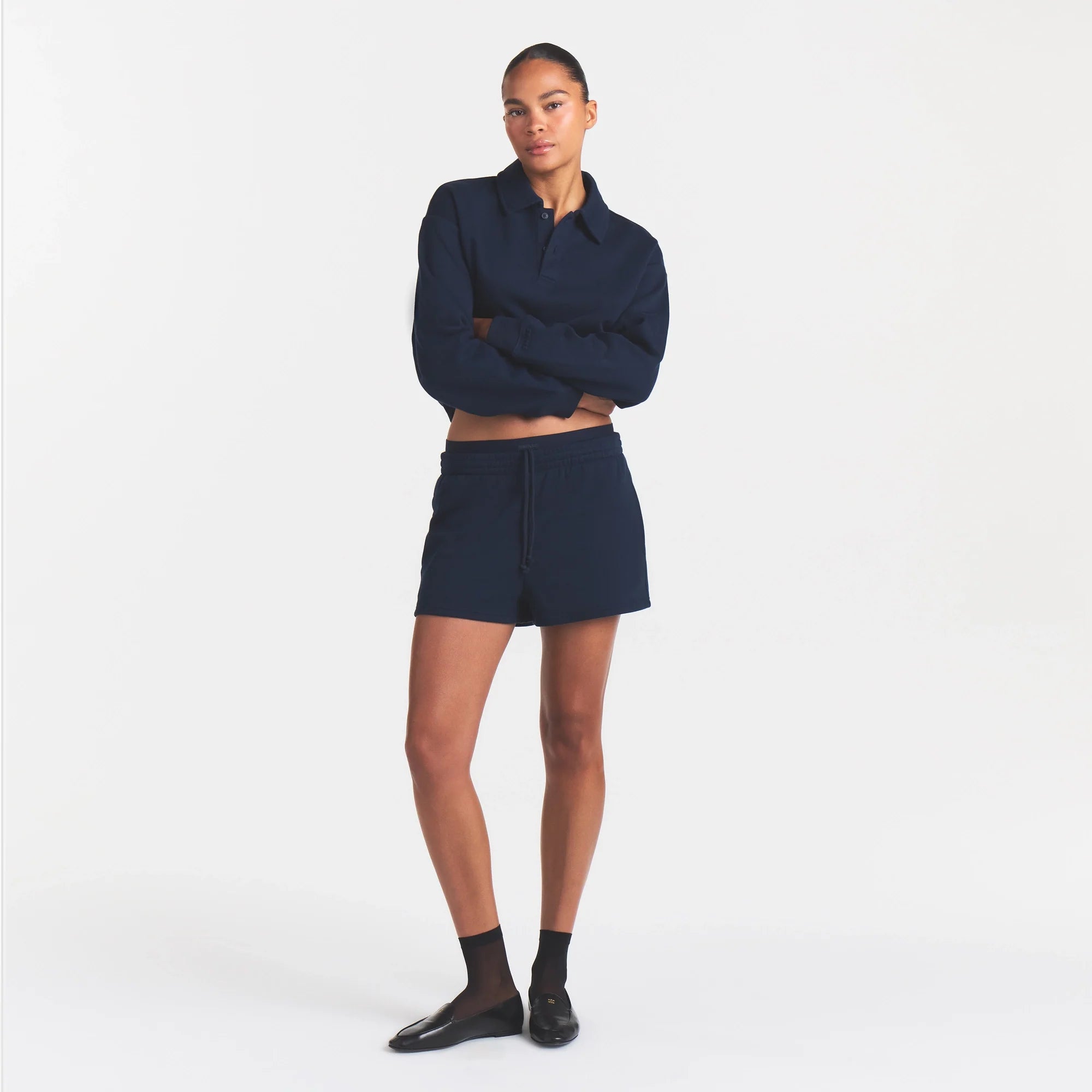 COTTON FLEECE DOUBLE WAISTBAND SHORT | NAVY ON A MODEL FRONT VIEW @ | FOCUS: 0.0, 1.0, 0.9