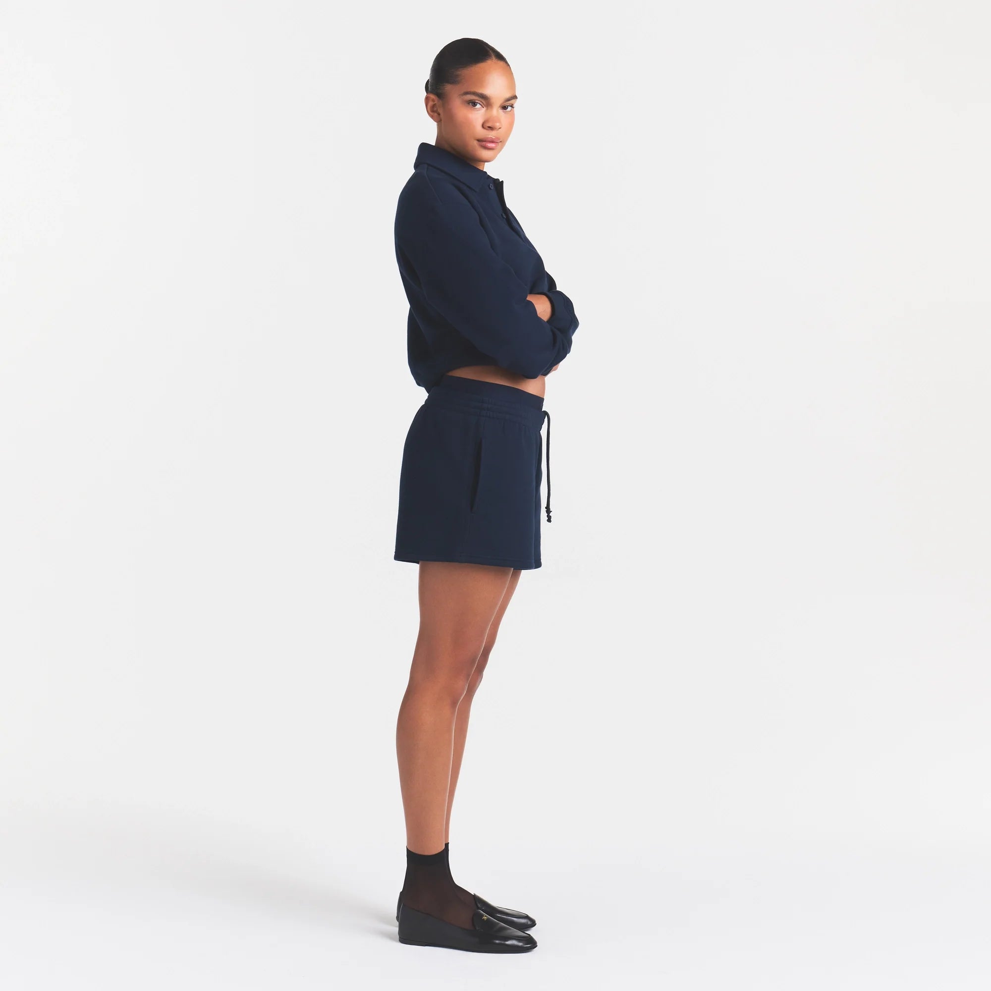 COTTON FLEECE DOUBLE WAISTBAND SHORT | NAVY ON A MODEL FRONT VIEW @ | FOCUS: 0.0, 1.0, 0.9