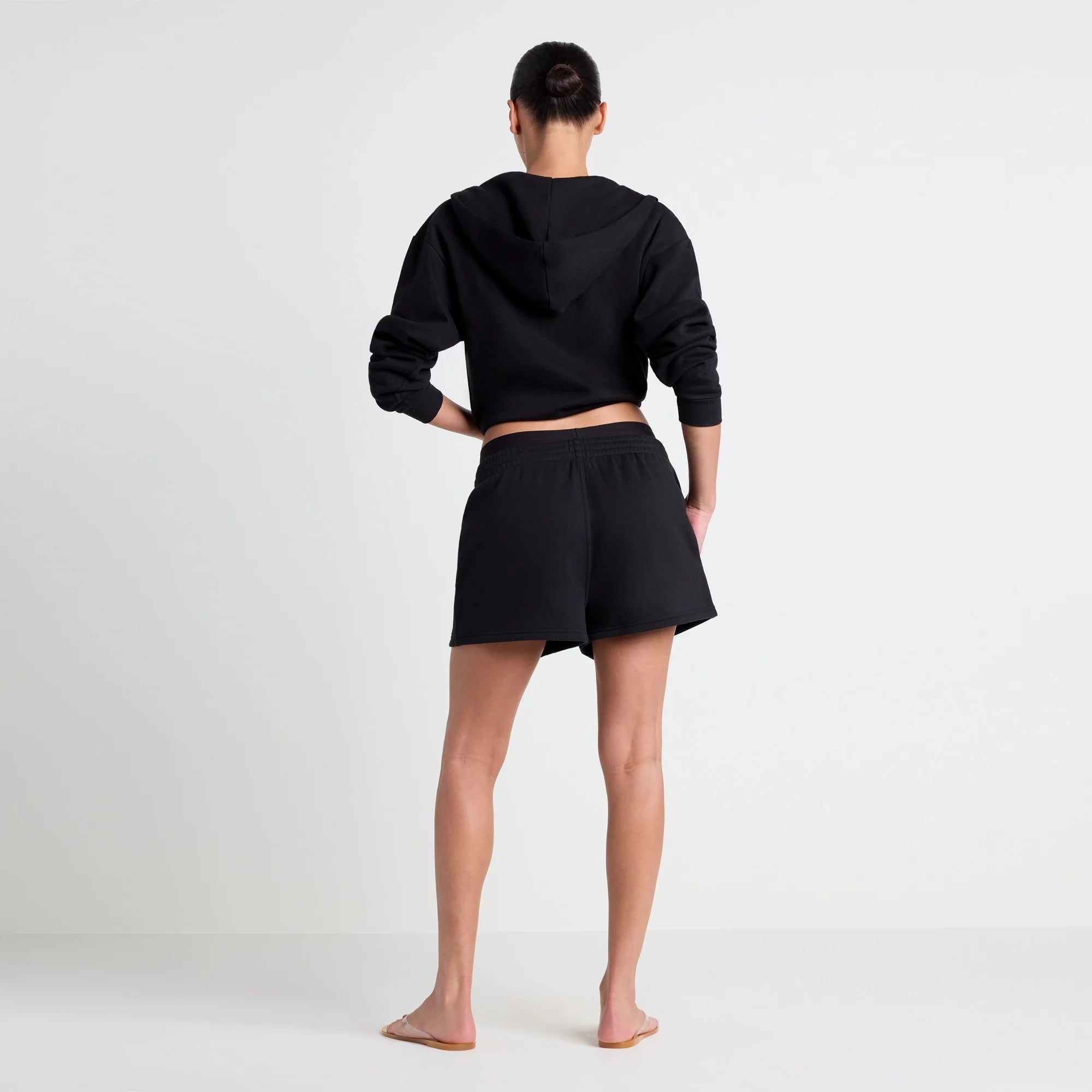 COTTON FLEECE DOUBLE WAISTBAND SHORT | ONYX ON A MODEL FRONT VIEW