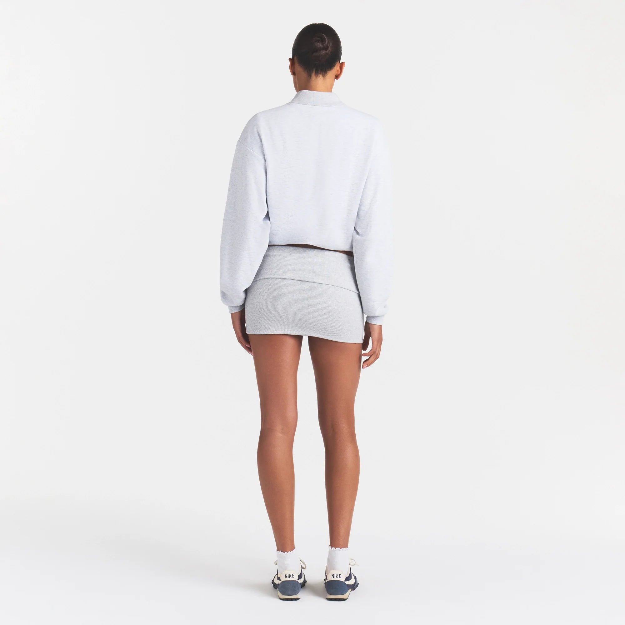 COTTON RIB FOLDOVER MINI SKIRT | LIGHT HEATHER GREY ON A MODEL | FOCUS: 0.0, 1.0, 0.9