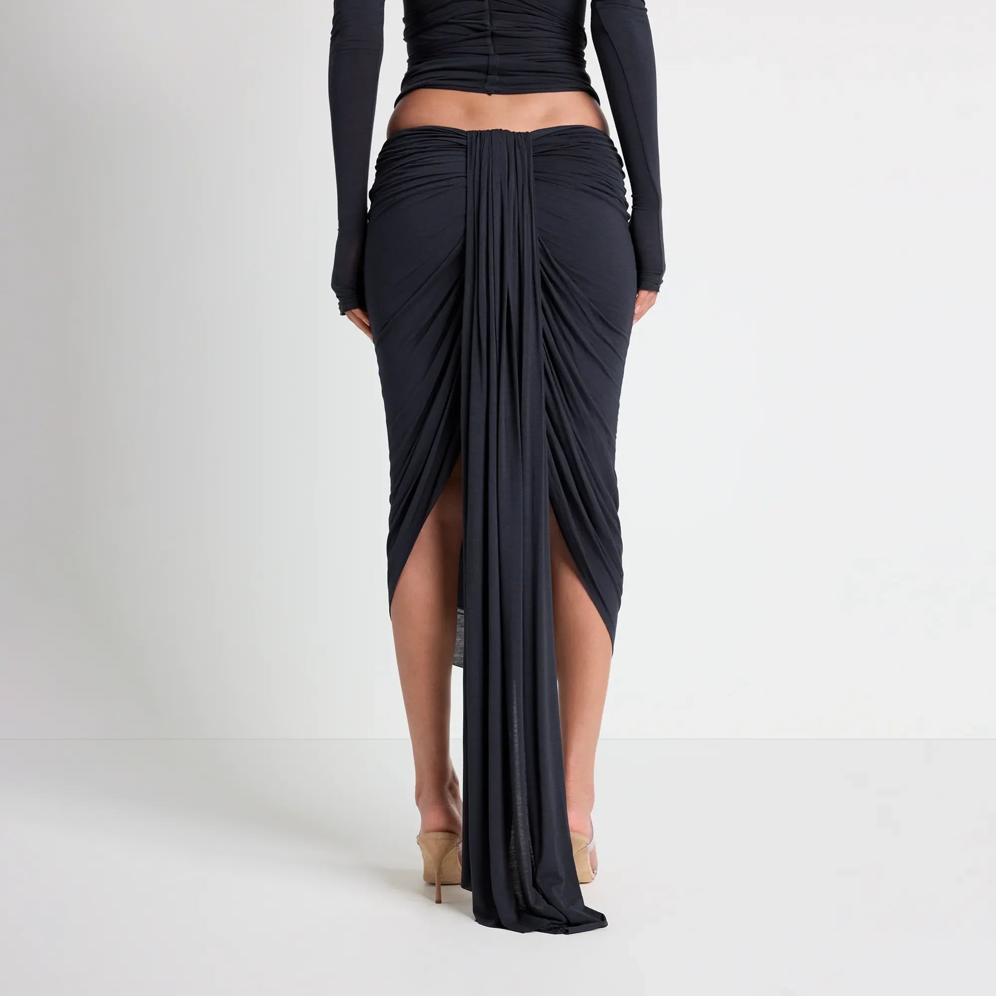 SHEER MODAL DRAPED SKIRT | ONYX ON A MODEL BACK VIEW| FOCUS: 0.0, 1.0, 0.9