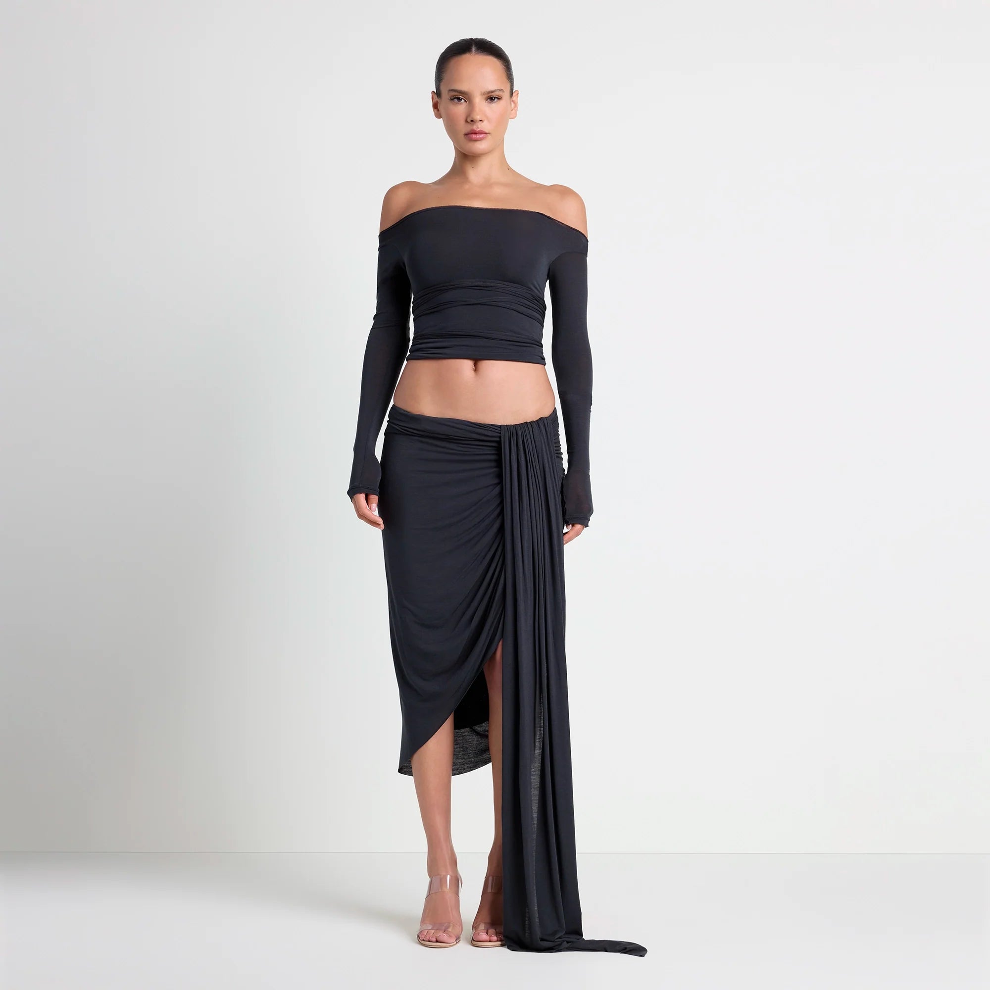 VETTESE X SKIMS SHEER MODAL DRAPED MIDI SKIRT | ONYX ON A MODEL FRONT VIEW| FOCUS: 0.0, 1.0, 0.9