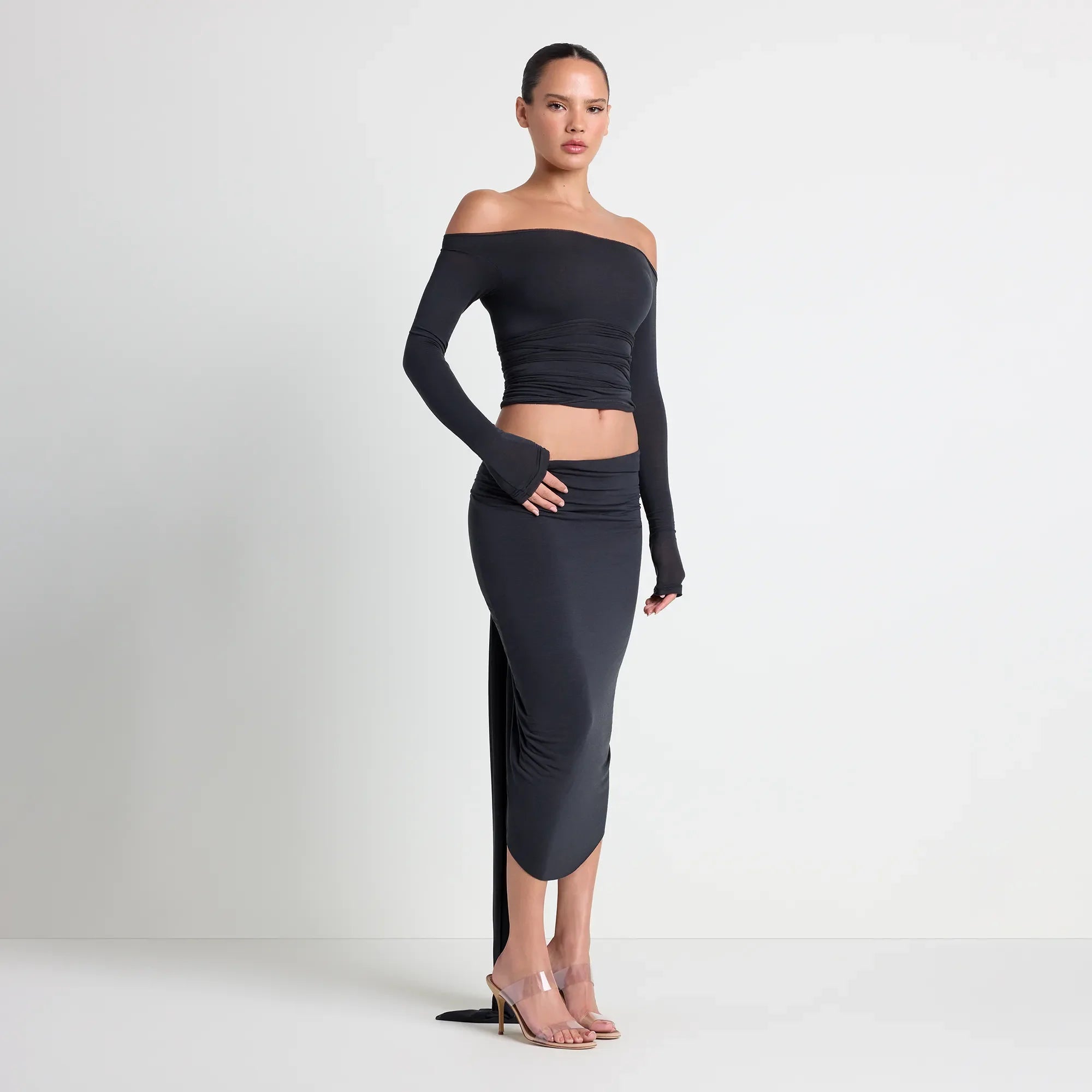 VETTESE X SKIMS SHEER MODAL DRAPED MIDI SKIRT | ONYX ON A MODEL SIDE VIEW| FOCUS: 0.0, 1.0, 0.9
