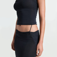 VETTESE X SKIMS SHEER MODAL MIDI SKIRT | ONYX ON A MODEL SIDE VIEW | FOCUS: 0.0, 1.0, 0.9