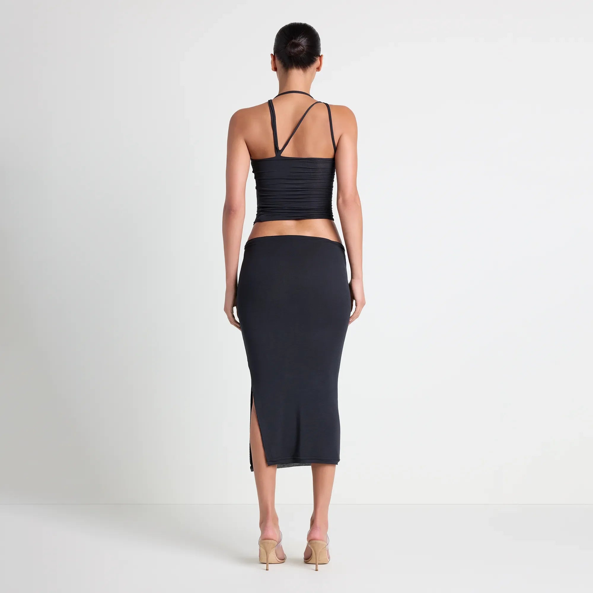 VETTESE X SKIMS SHEER MODAL MIDI SKIRT | ONYX ON A MODEL BACK VIEW | FOCUS: 0.0, 1.0, 0.9