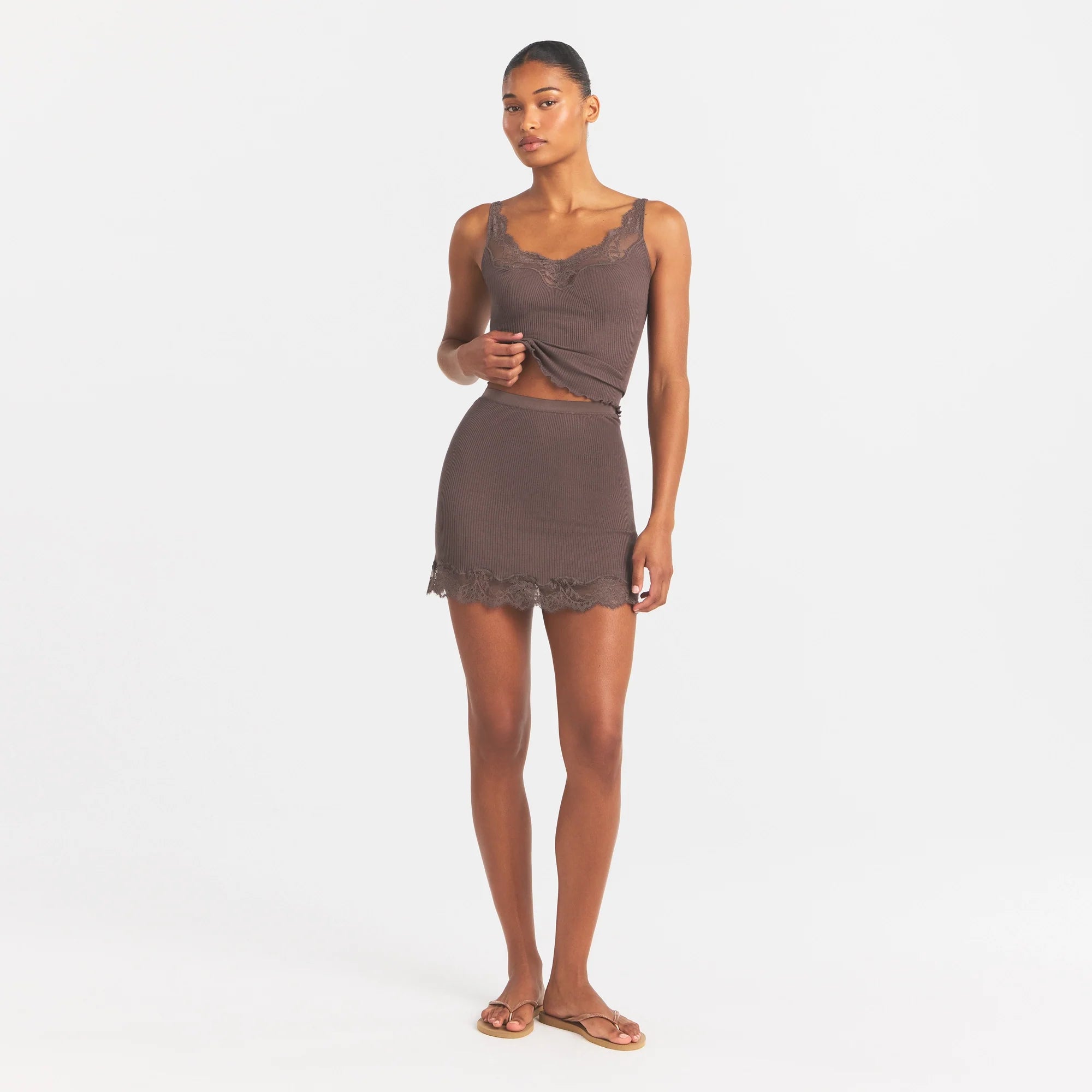 RIB KNIT LACE MINI SKIRT | AMETHYST ON A MODEL FRONT VIEW @ | FOCUS: 0.0, 1.0, 0.9