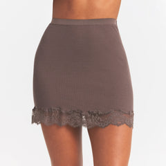 RIB KNIT LACE MINI SKIRT | AMETHYST ON A MODEL SIDE VIEW @ | FOCUS: 0.0, 1.0, 0.9
