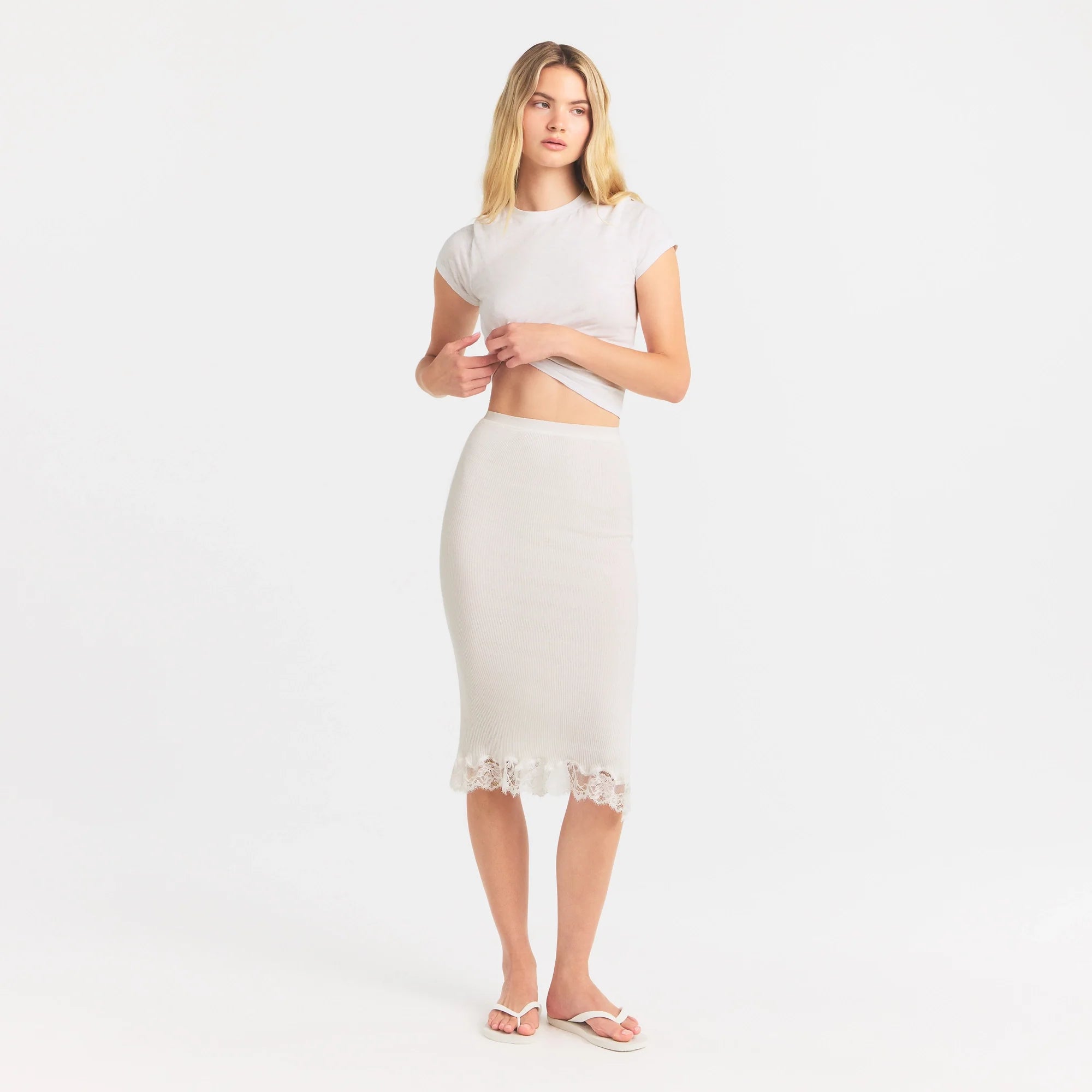 RIB KNIT LACE MIDI SKIRT | EGRET ON A MODEL FRONT VIEW @ | FOCUS: 0.0, 1.0, 0.9
