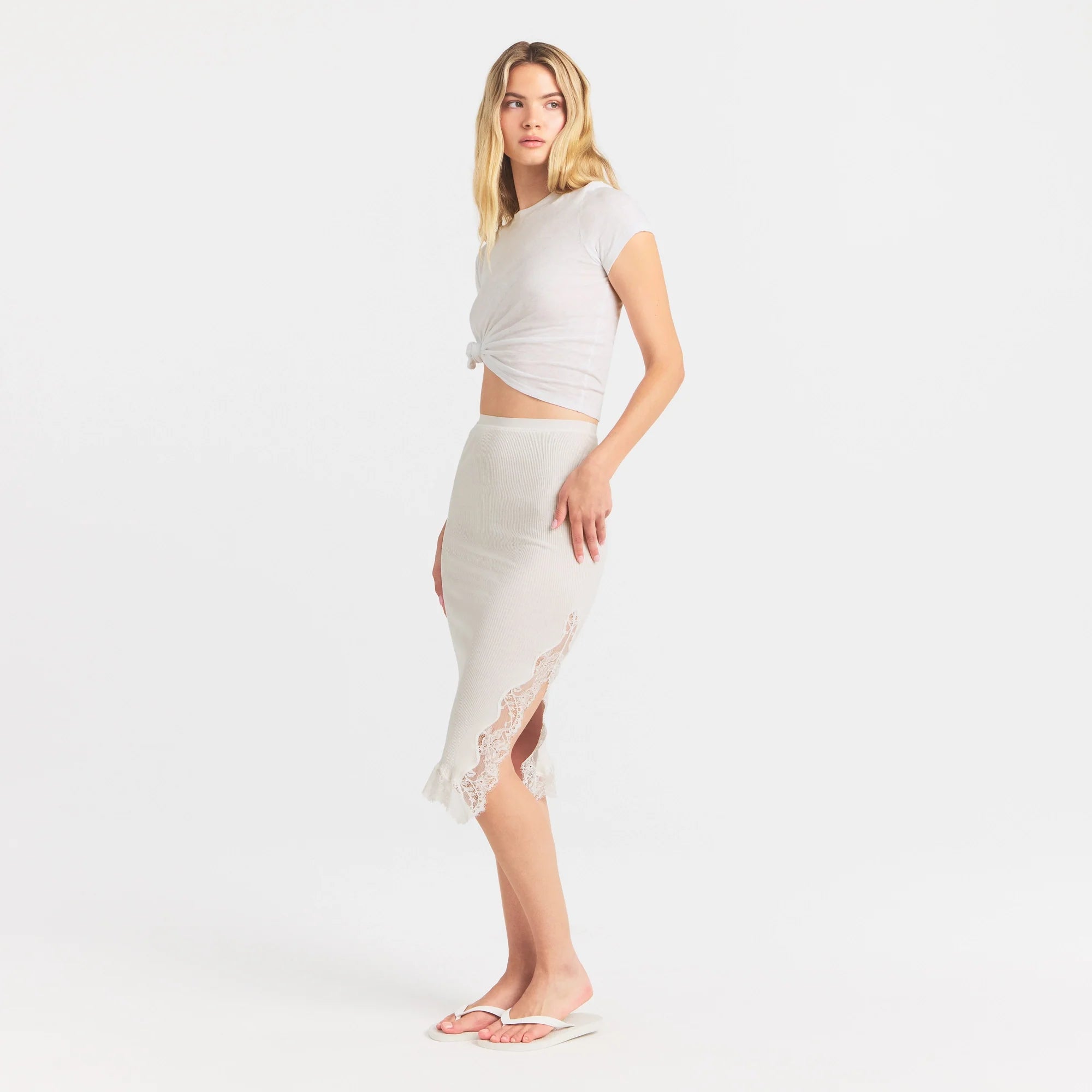 RIB KNIT LACE MIDI SKIRT | EGRET ON A MODEL FRONT VIEW @ | FOCUS: 0.0, 1.0, 0.9