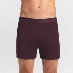 SKIMS STRETCH MENS KNIT BOXER | CURRANT ON A MODEL FRONT VIEW @ | FOCUS: 0.0, 1.0, 0.9