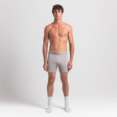 SKIMS STRETCH MENS KNIT BOXER | OYSTER ON A MODEL FRONT VIEW @ | FOCUS: 0.0, 1.0, 0.9