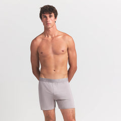 SKIMS STRETCH MENS KNIT BOXER | OYSTER ON A MODEL FRONT VIEW @ | FOCUS: 0.0, 1.0, 0.9