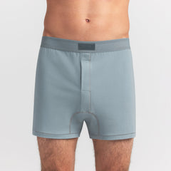 SKIMS COTTON MENS KNIT BOXER | SKY ON A MODEL FRONT VIEW @ | FOCUS: 0.0, 1.0, 0.9