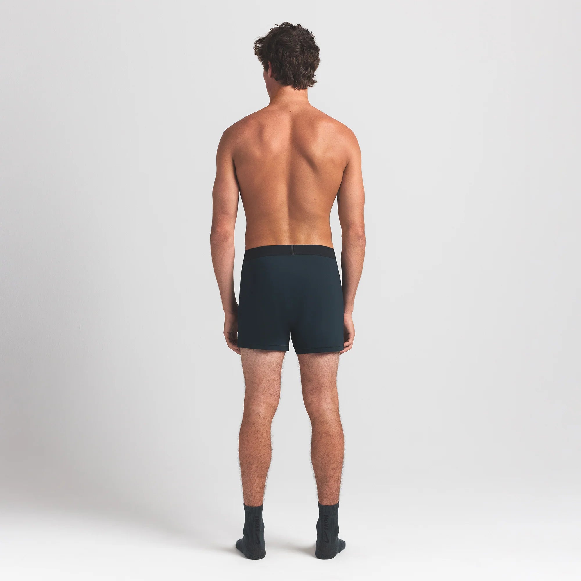 SKIMS COTTON MENS KNIT BOXER | VERDANT ON A MODEL BACK VIEW @ | FOCUS: 0.0, 1.0, 0.9