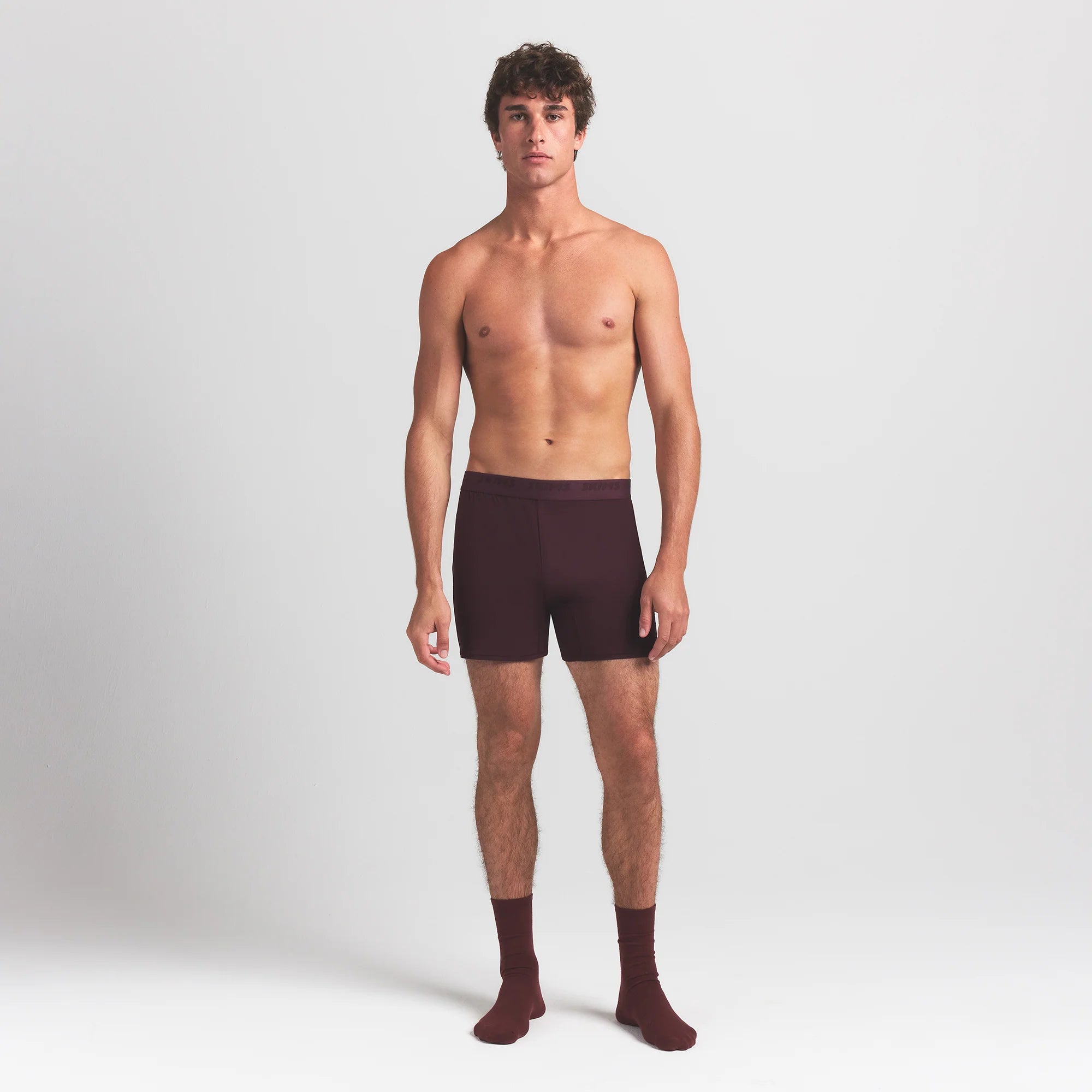 SKIMS STRETCH MENS KNIT BOXER 3-PACK | RAVEN MULTI ON A MODEL FRONT VIEW @ | FOCUS: 0.0, 1.0, 0.9