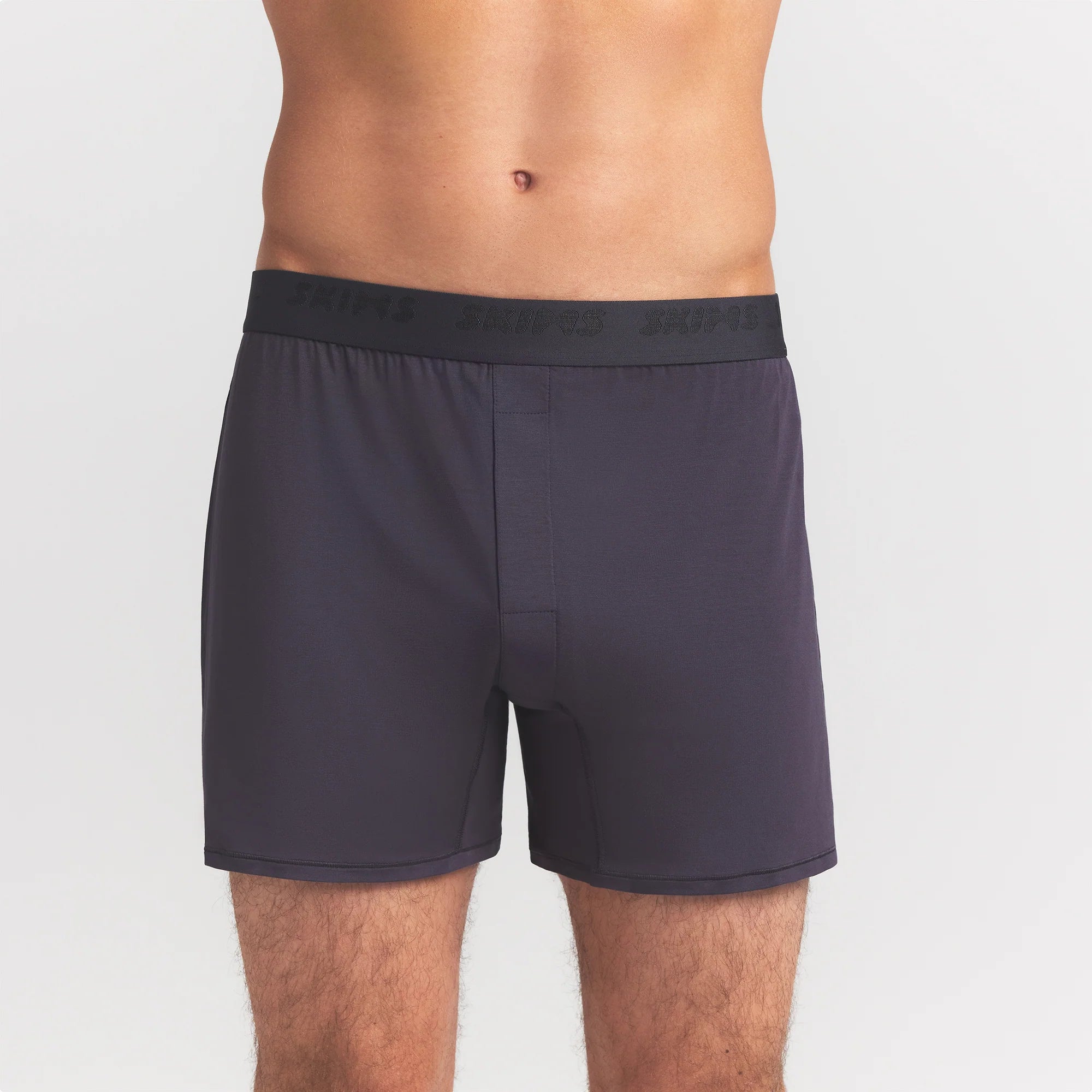 SKIMS STRETCH MENS KNIT BOXER 3-PACK | RAVEN MULTI ON A MODEL FRONT VIEW @ | FOCUS: 0.0, 1.0, 0.9