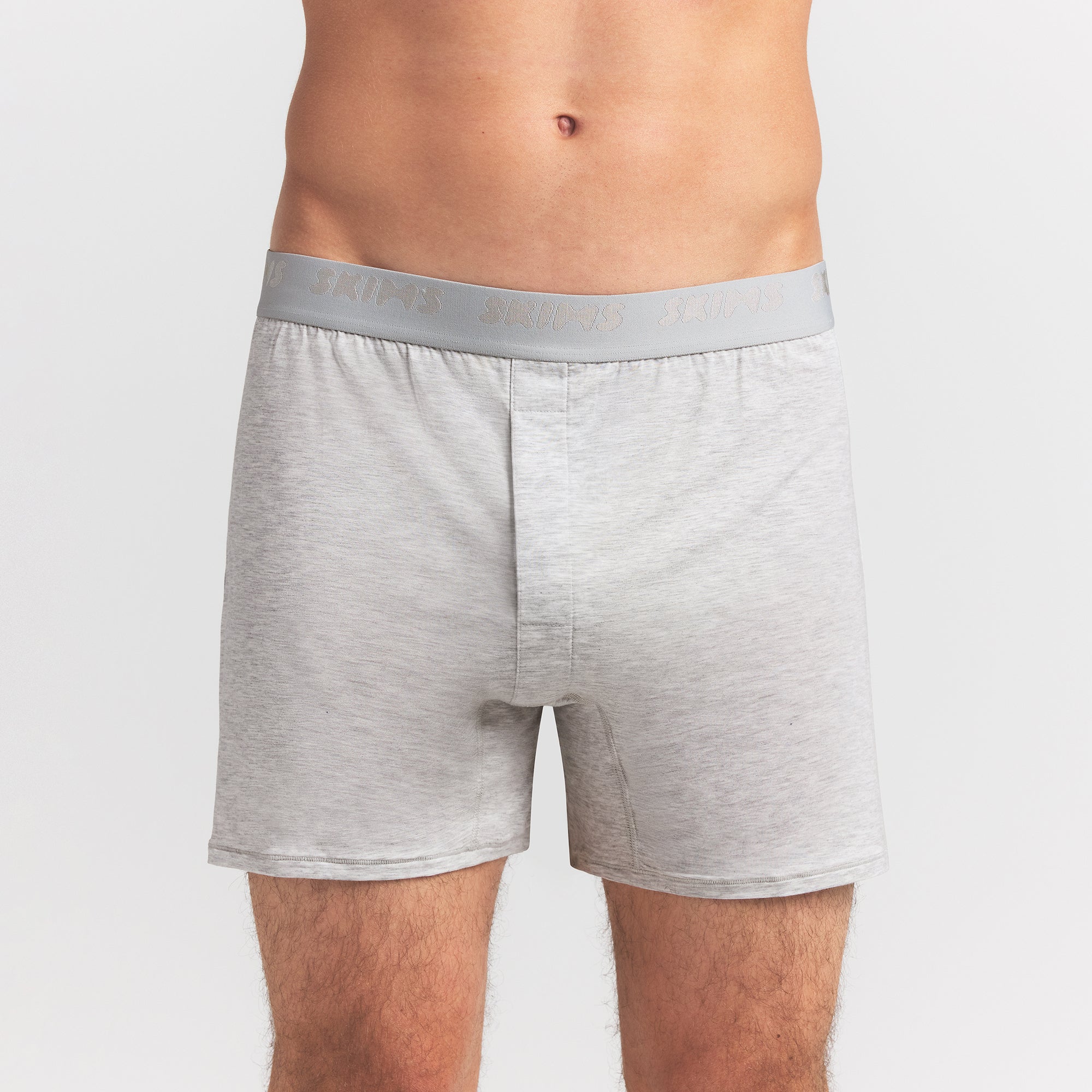 SKIMS STRETCH MENS KNIT BOXER 3-PACK | RAVEN MULTI ON A MODEL FRONT VIEW @ | FOCUS: 0.0, 1.0, 0.9