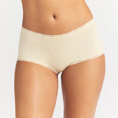 LIGHTWEIGHT COTTON LACE BOY SHORT | BUTTER TONAL ON A MODEL SIDE VIEW @ | FOCUS: 0.0, 1.0, 0.9