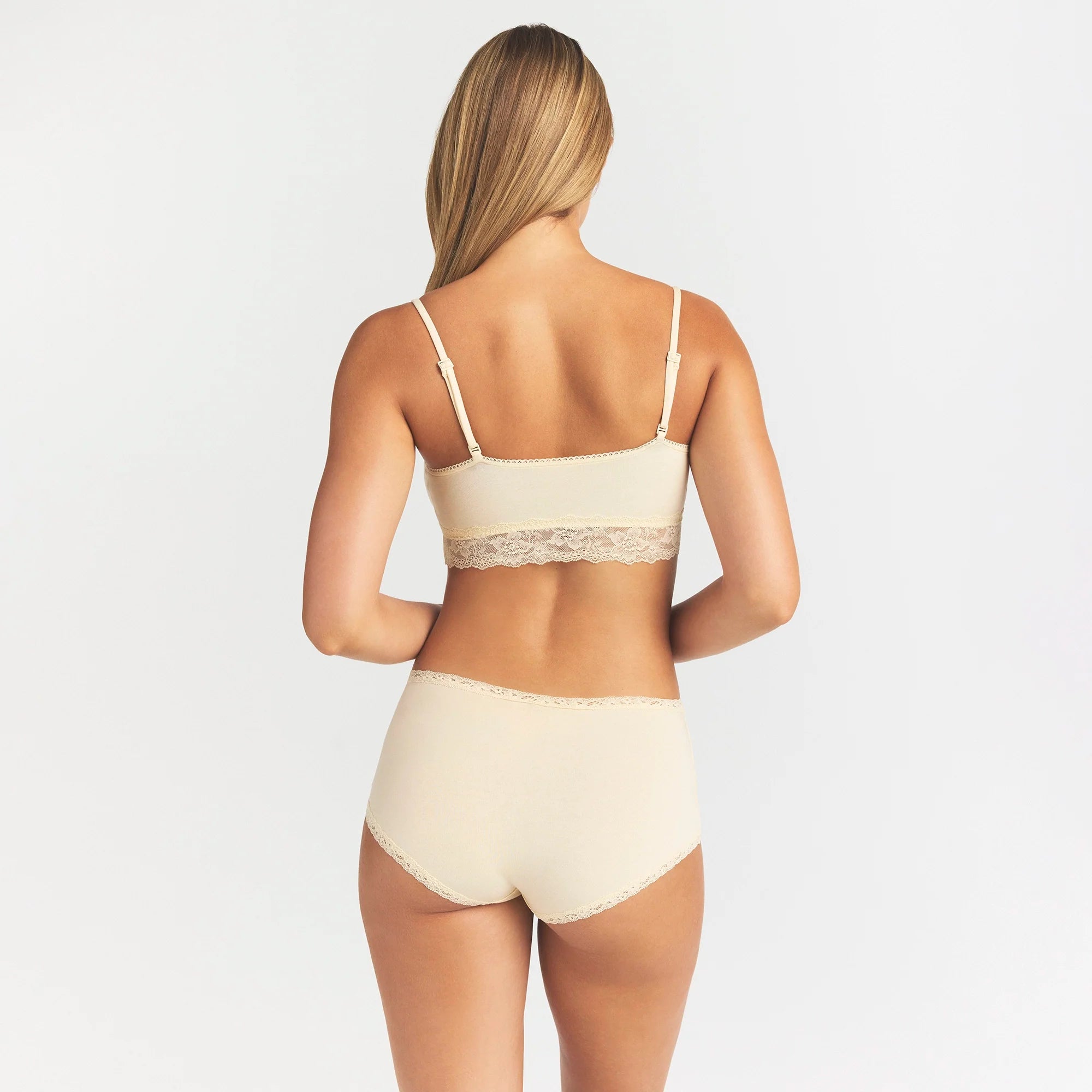LIGHTWEIGHT COTTON LACE BOY SHORT | BUTTER TONAL ON A MODEL SIDE VIEW @ | FOCUS: 0.0, 1.0, 0.9